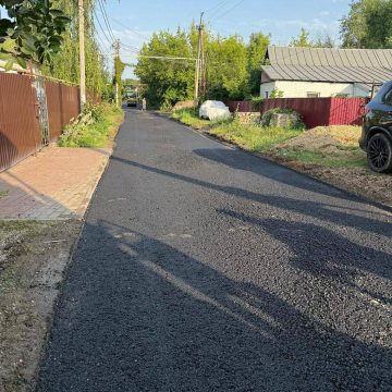 На улице Димитрова в Липецке завершают асфальтирование дороги